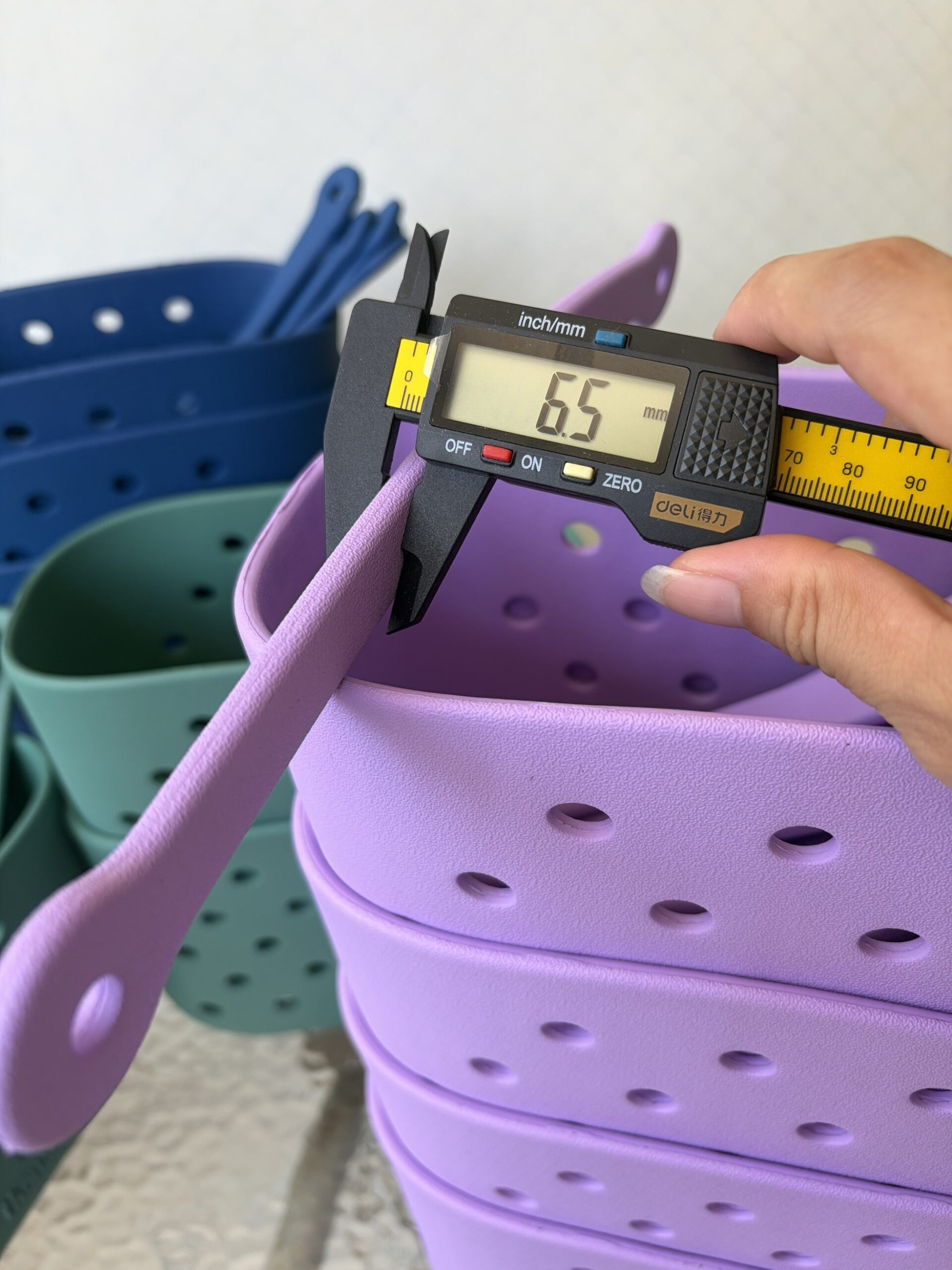 JoyMould Quality Control Inspector Testing tote Thickness