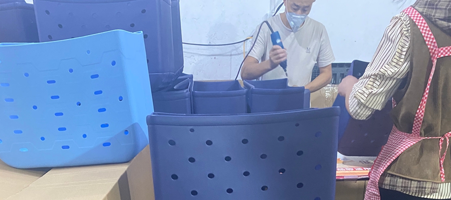 Quality Control Inspector Examining Freshly Molded EVA Bags